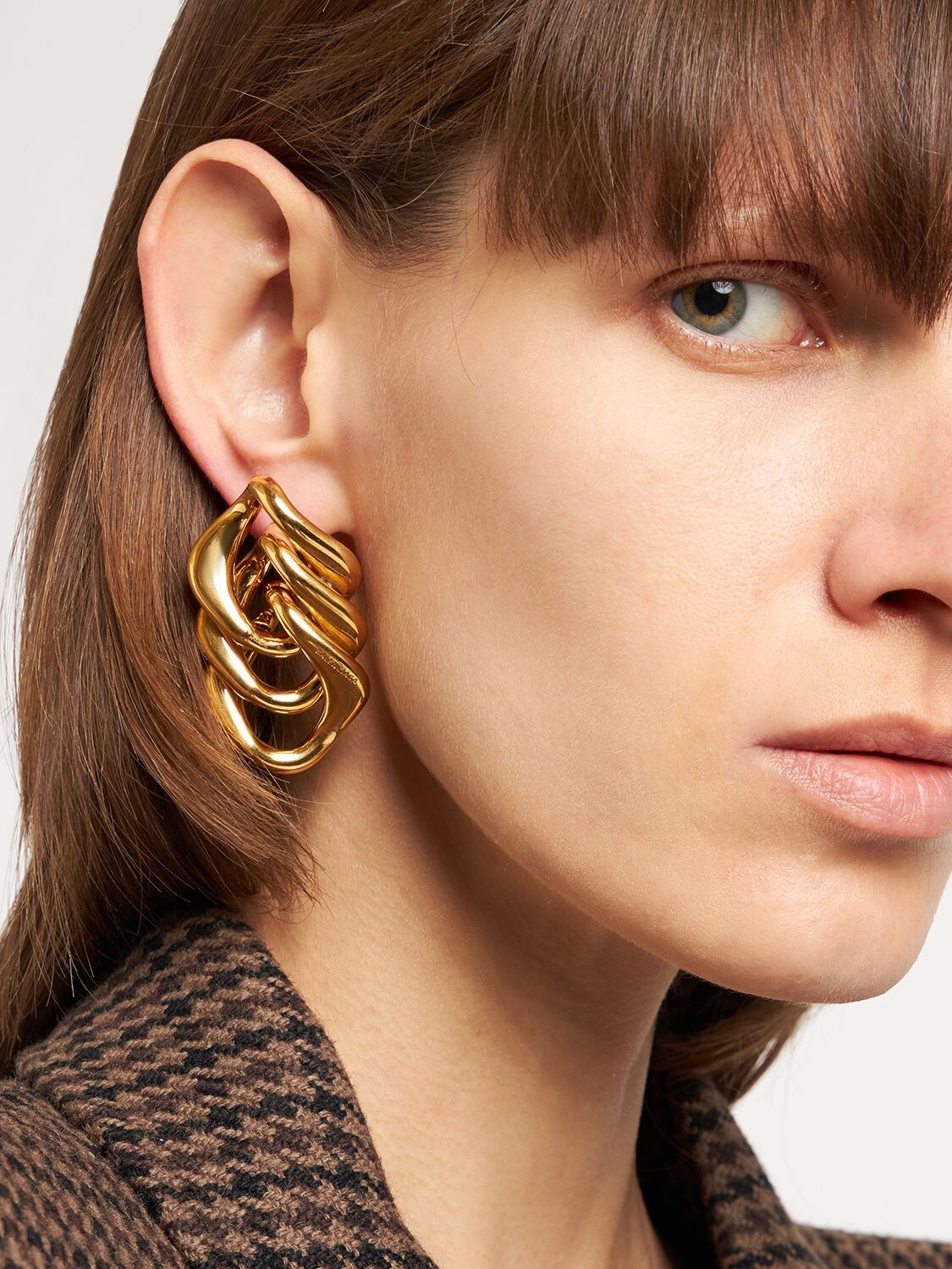 Shop Balenciaga Linked Brass Earrings In Gold