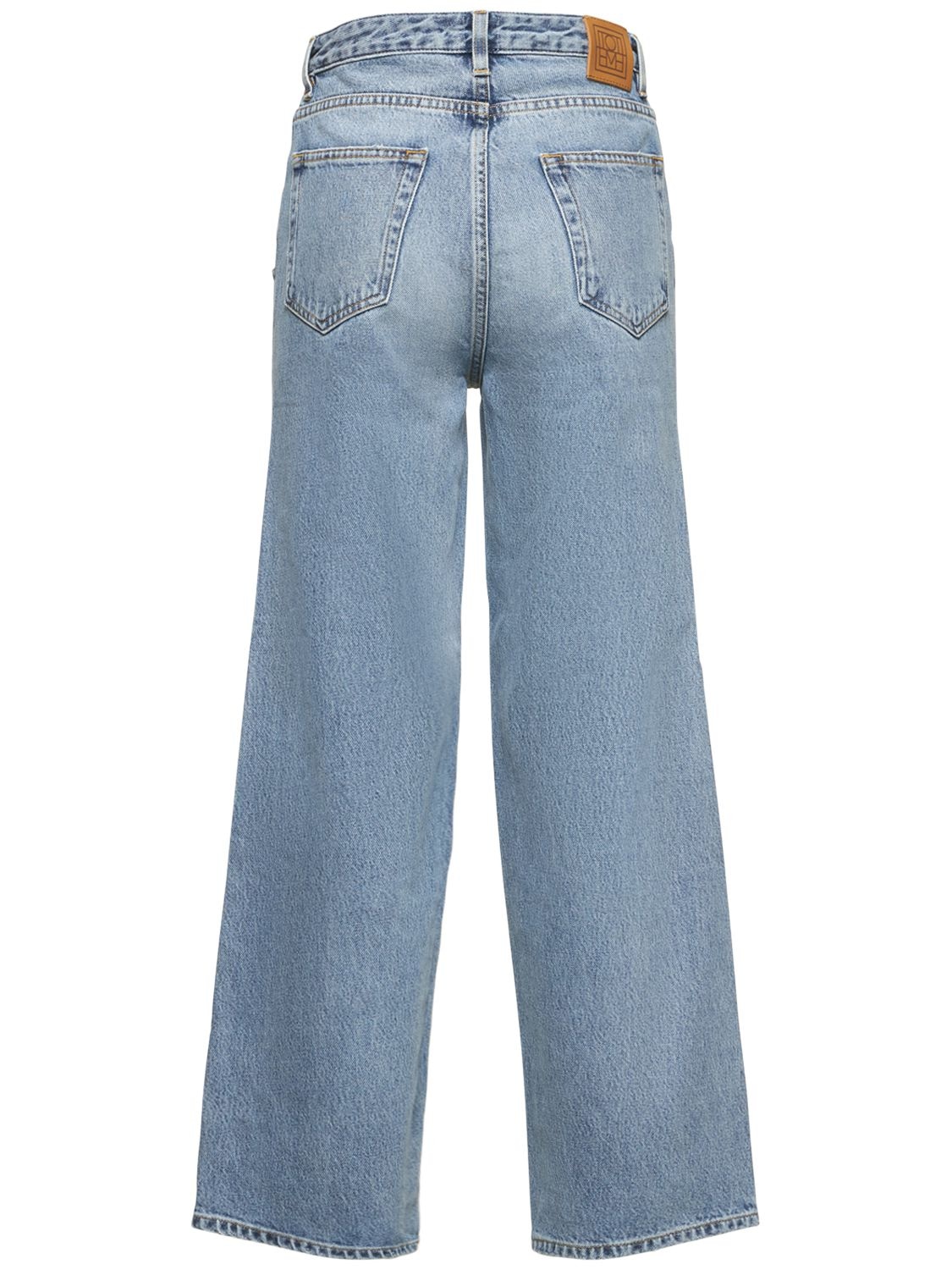 Shop Totême Organic Cotton Denim Flared Jeans In Blue