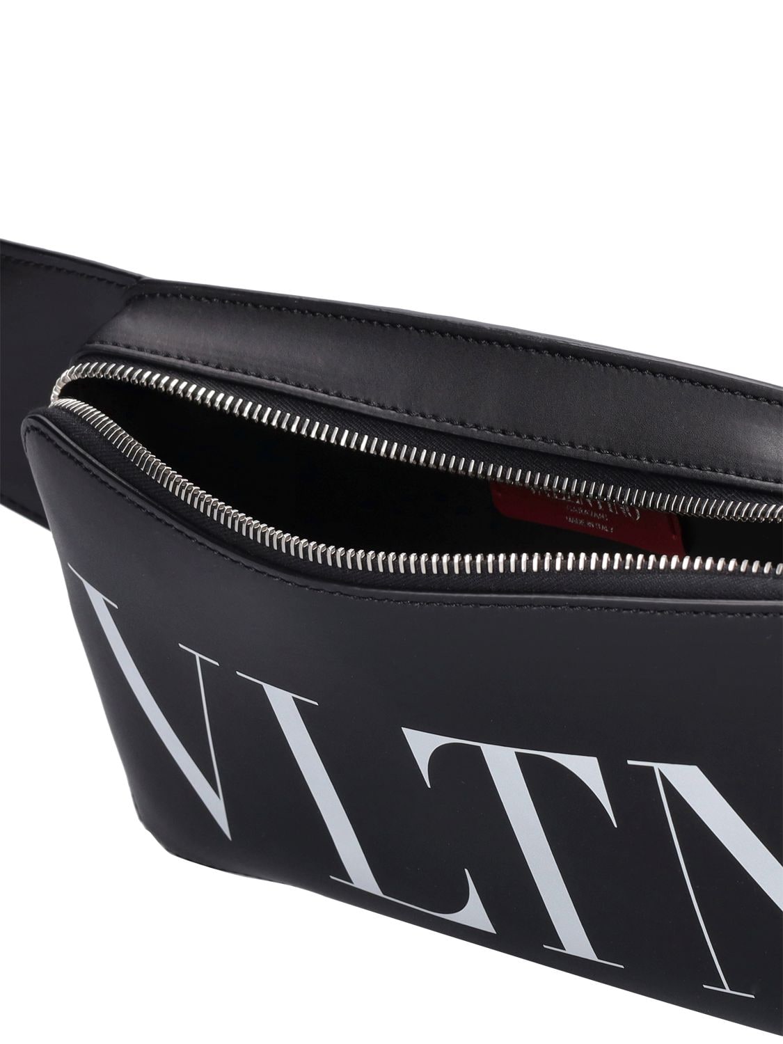 Shop Valentino Vltn Leather Belt Bag In Black,white