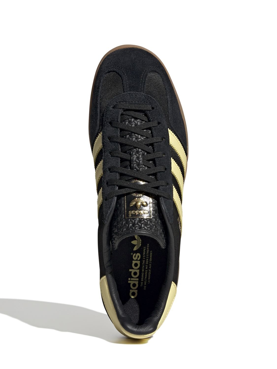 Adidas shoes black store with yellow stripes