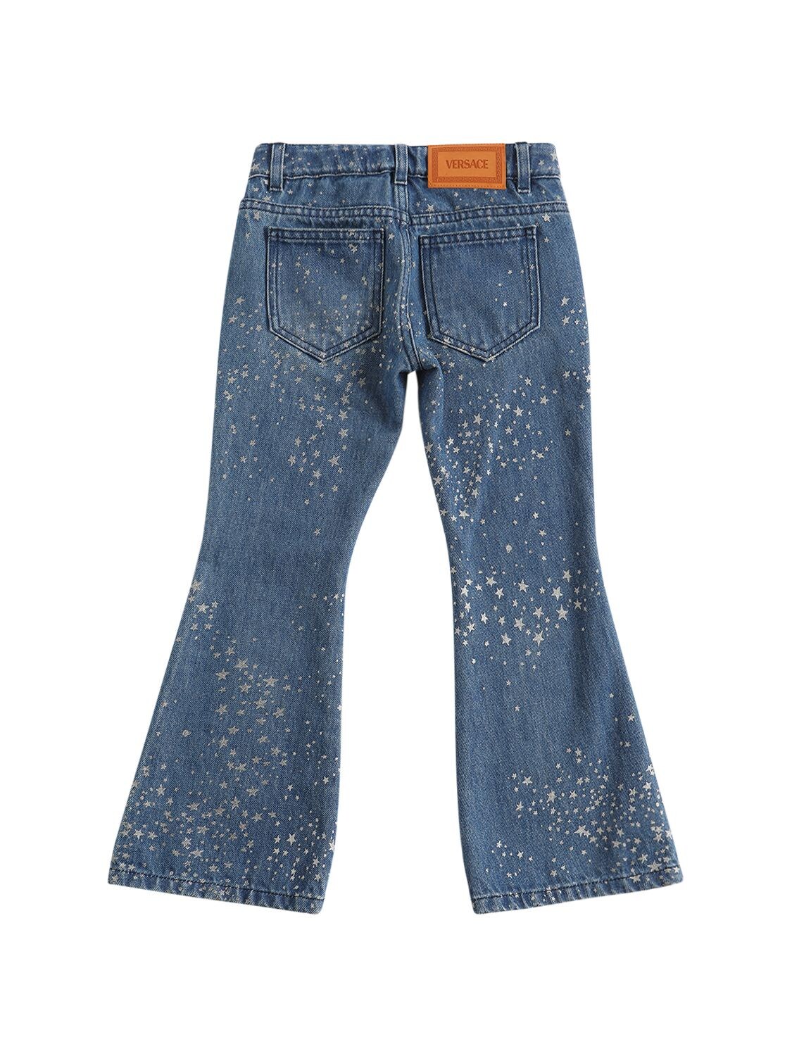 Shop Versace Glittered Cotton Denim Jeans