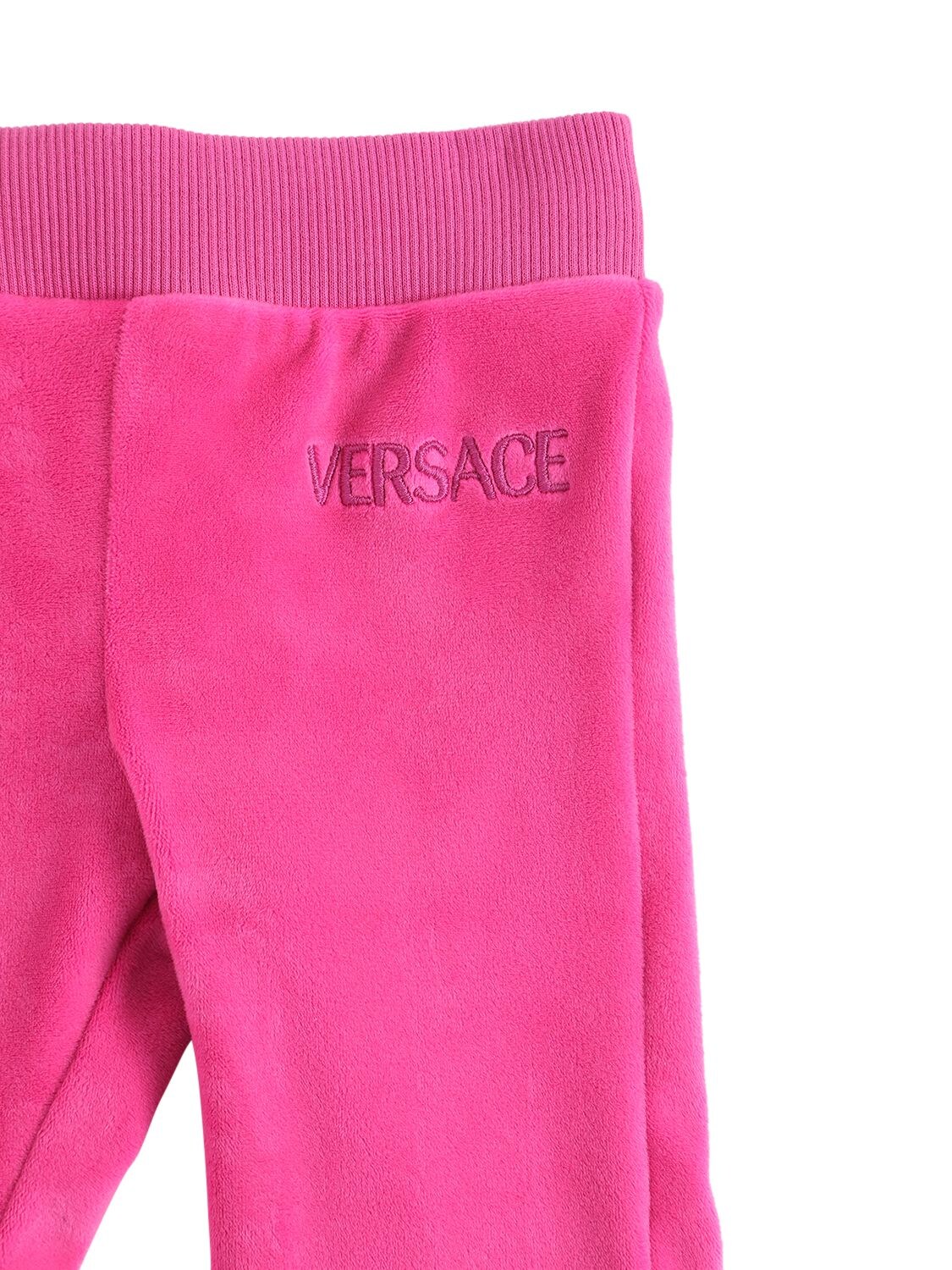 Shop Versace Embroidered Logo Cotton Velvet Pants In Fuchsia