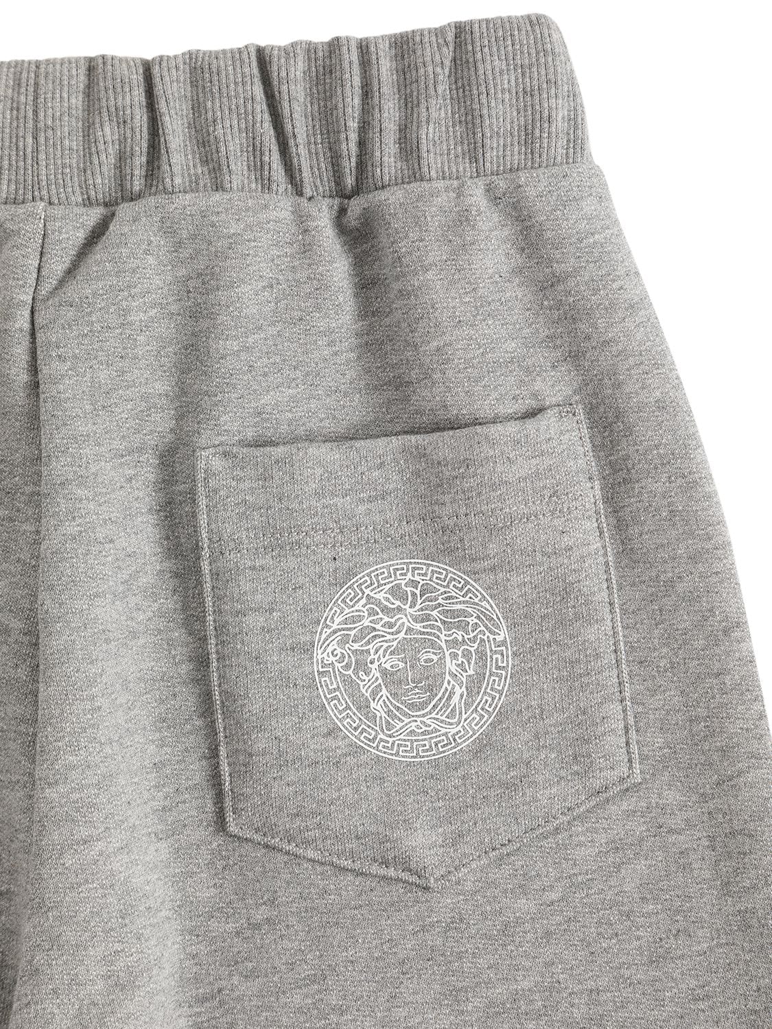 Shop Versace Greca Print Cotton Sweatpants In Grey