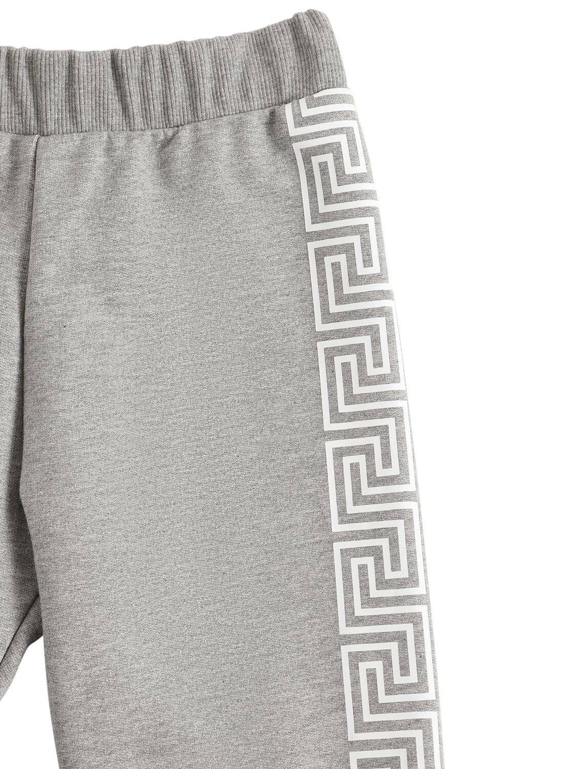 Shop Versace Greca Print Cotton Sweatpants In Grey