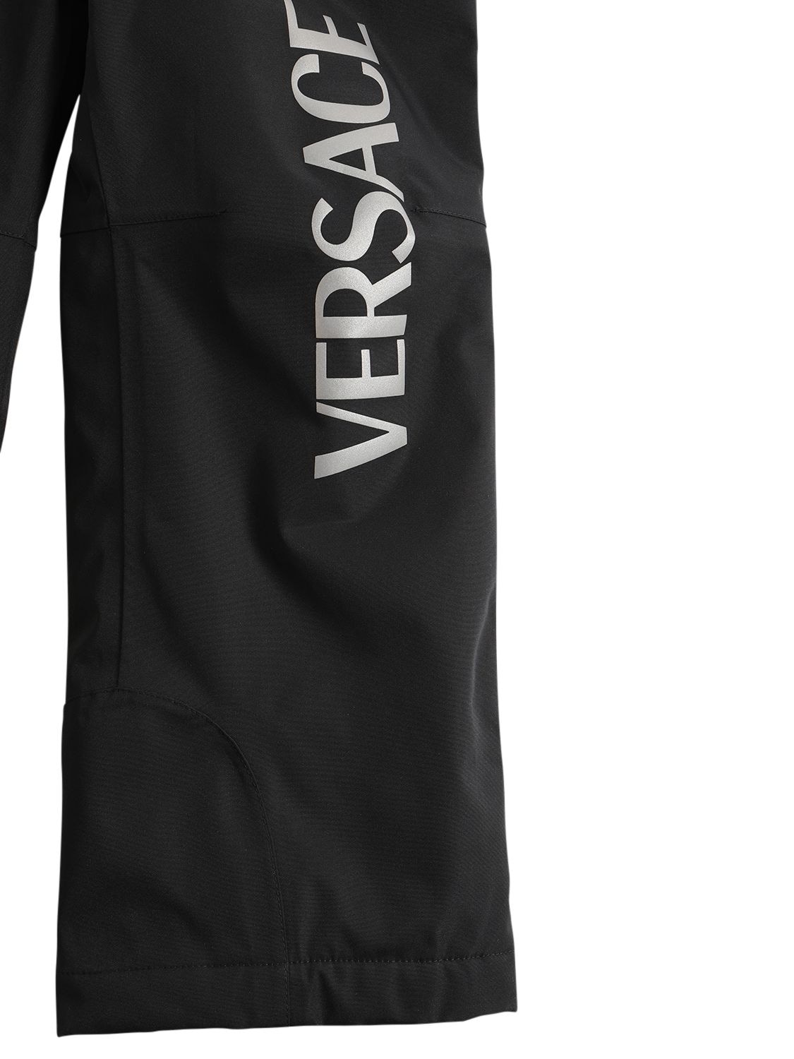 Shop Versace Logo Print Nylon Puffer Ski Pants In Black