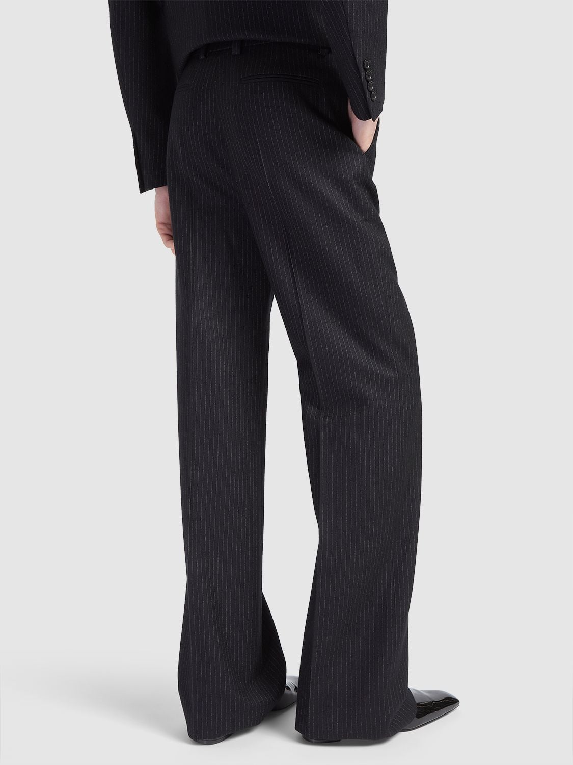 Shop Saint Laurent Pleated Wool Blend Pants In Black