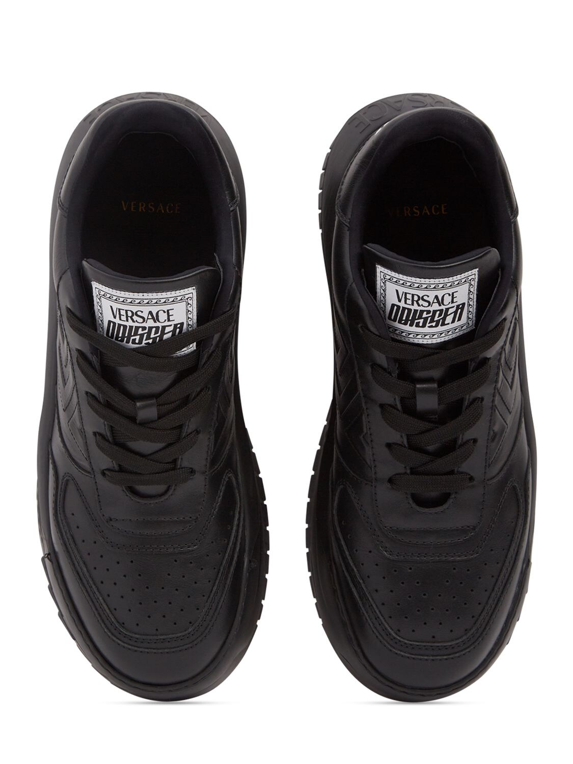 Shop Versace Leather Sneakers In Black