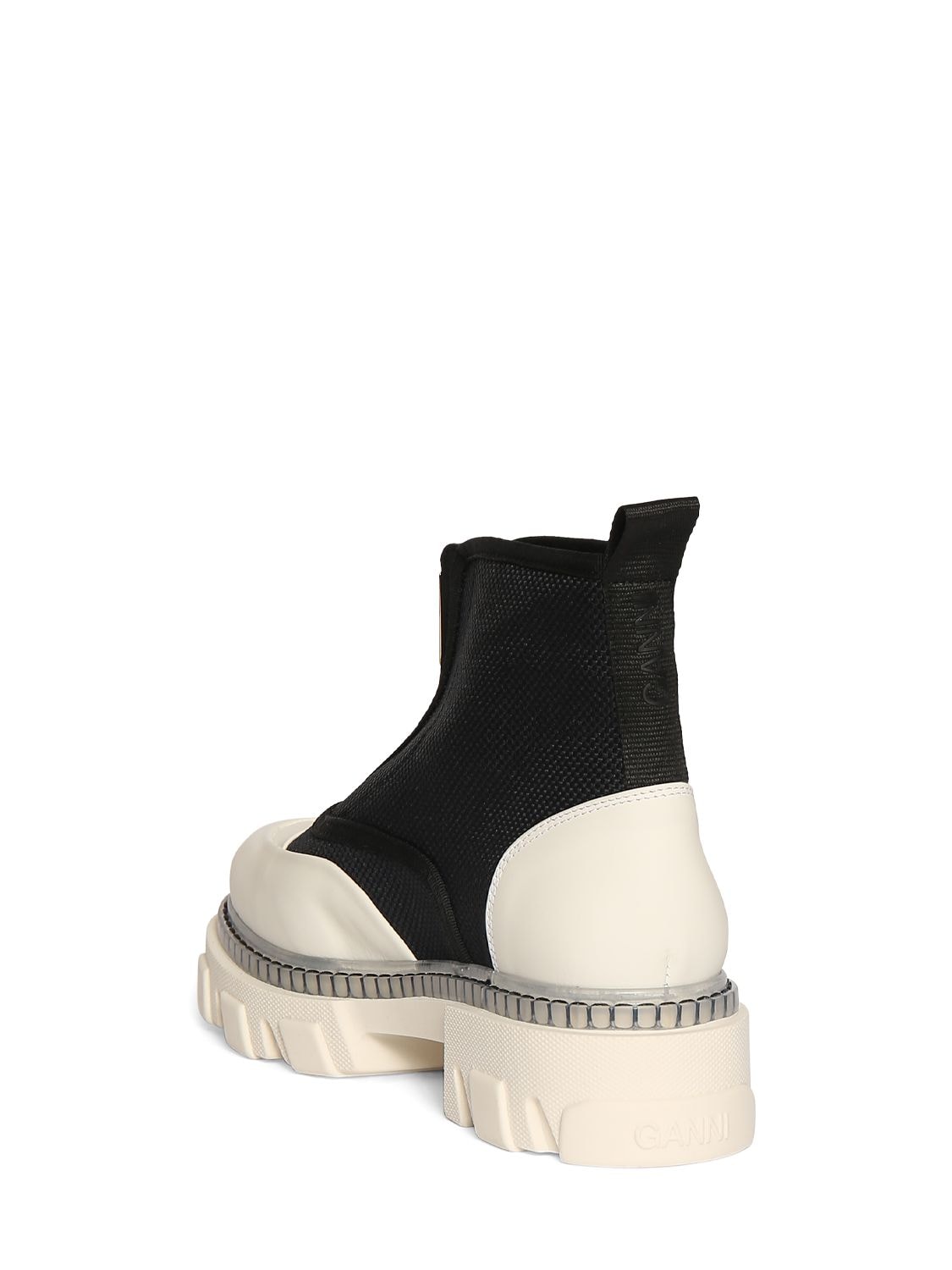 Shop Ganni 50mm Cleated Low Zip Boots In Black,white