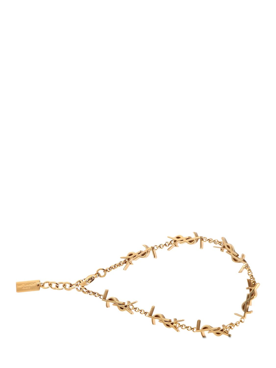 Shop Saint Laurent Cassandre Brass Multi Ysl Bracelet In Gold
