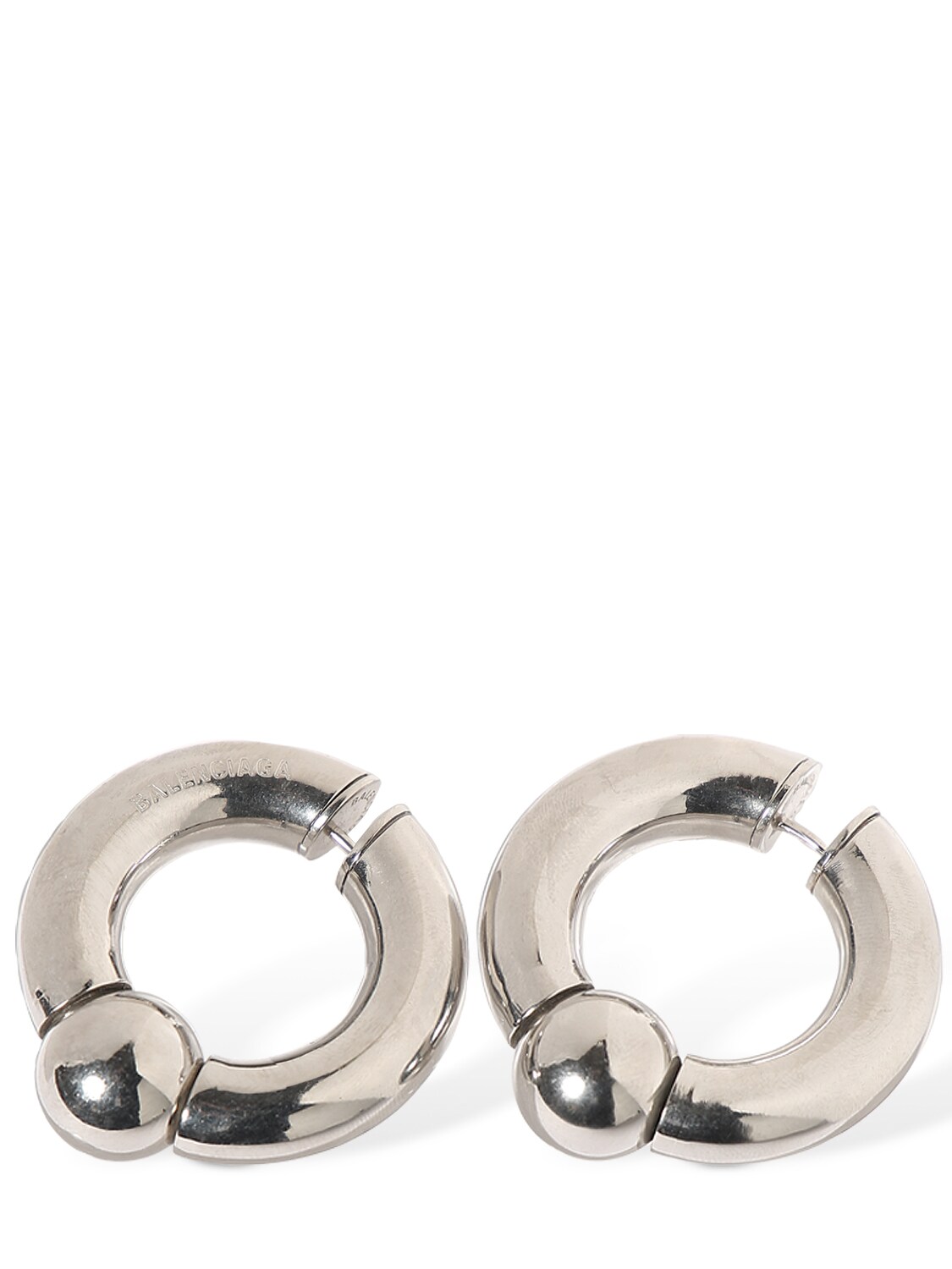Shop Balenciaga Mega Brass Earrings In Silver