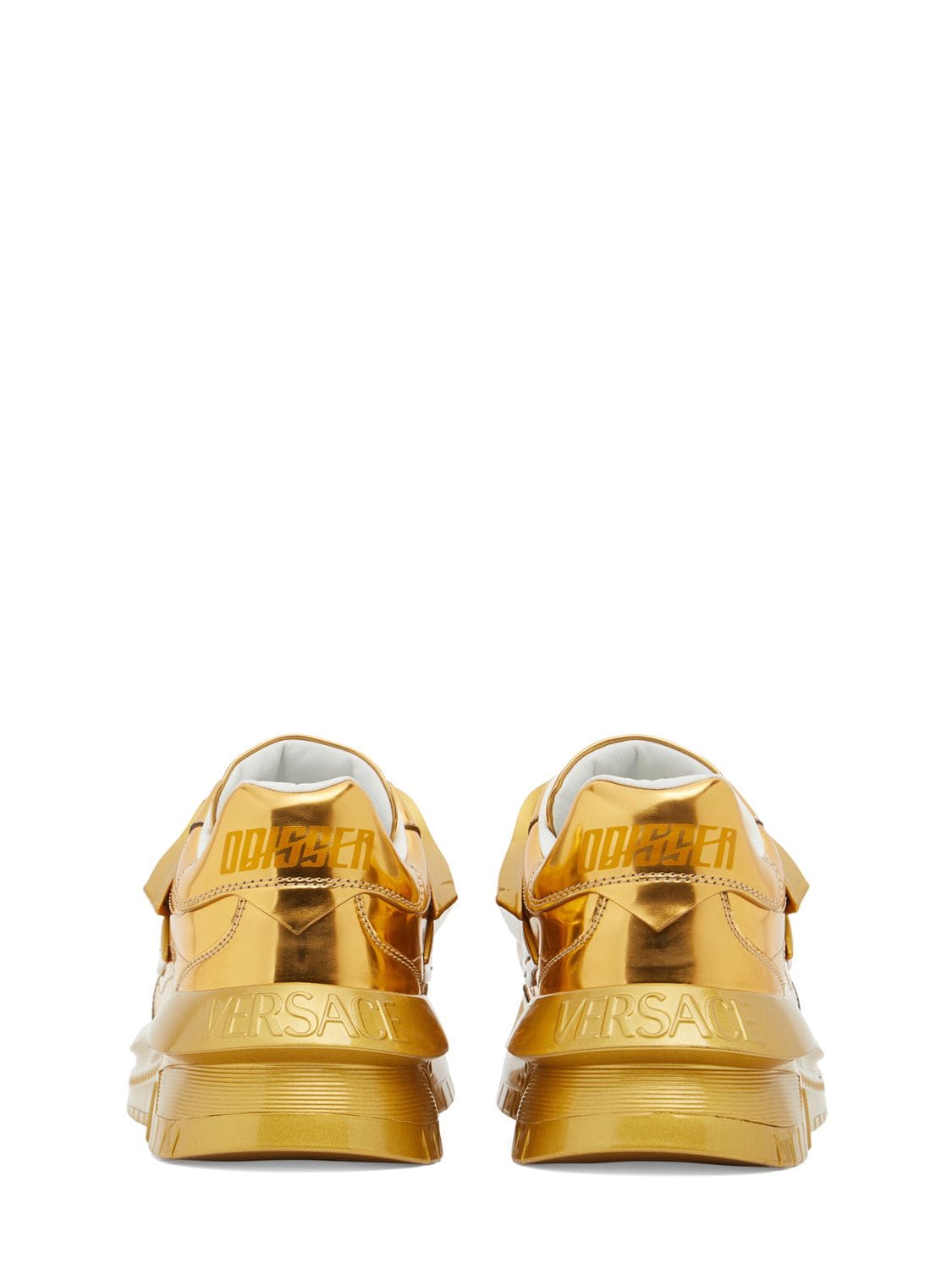 Shop Versace Metallic Leather Sneakers In Gold