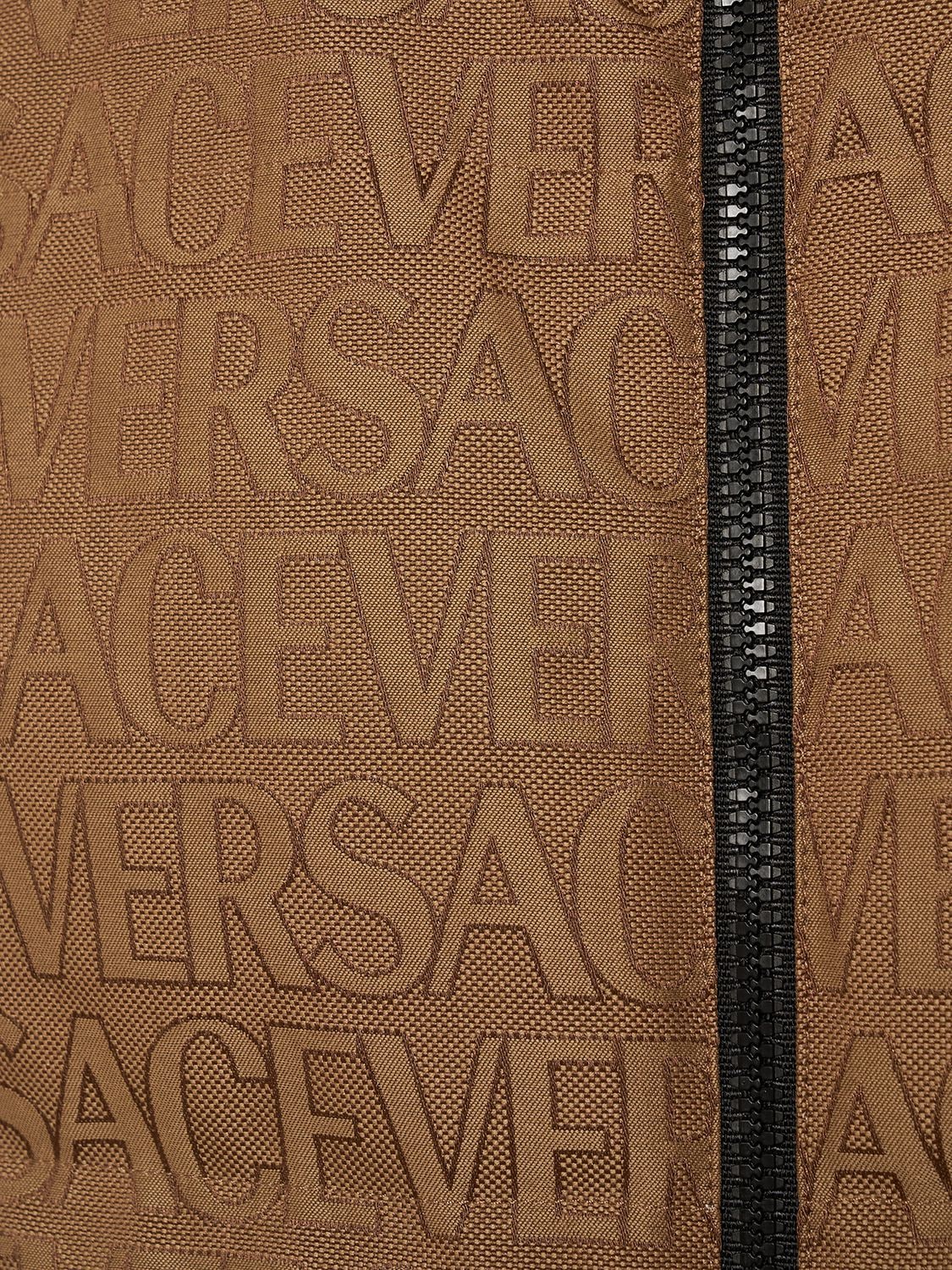 Shop Versace Monogram Cotton Blend Down Jacket In Brown