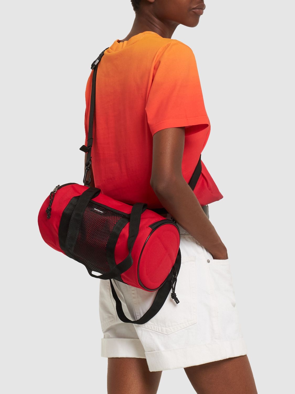 Shop Eastpak X Telfar 7l Medium Telfar Duffle Bag In Telfar Red