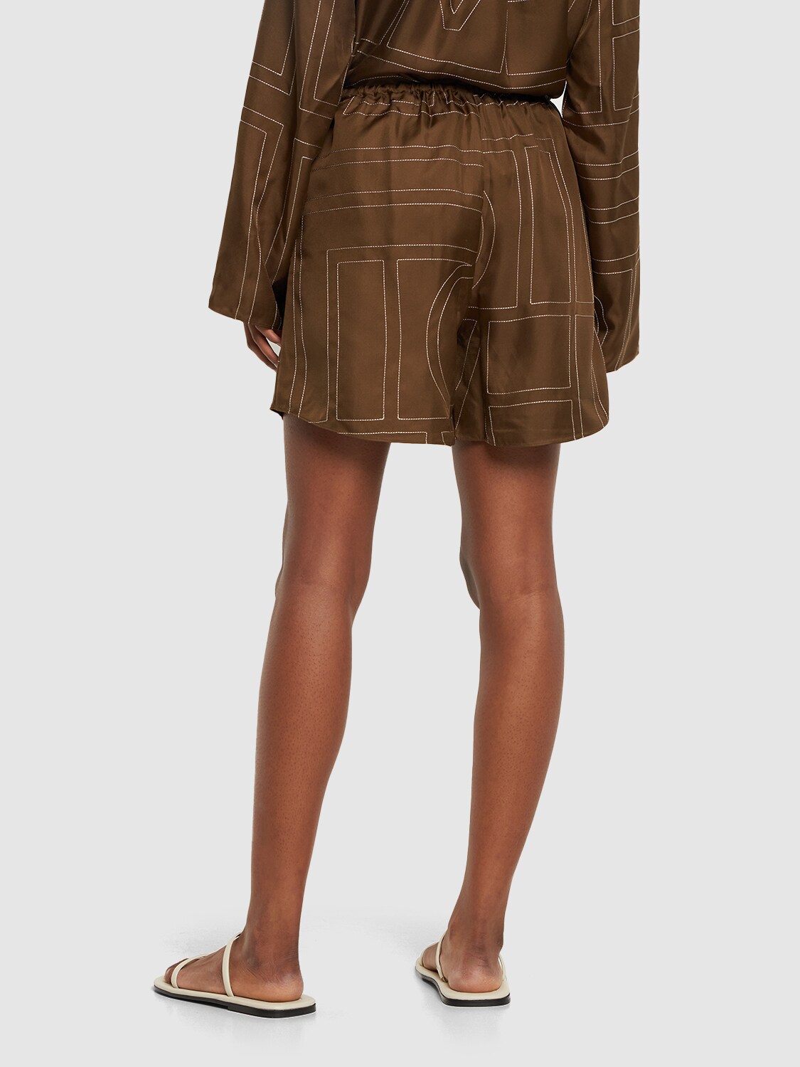 Monogram Silk Twill Shorts in Brown - Toteme