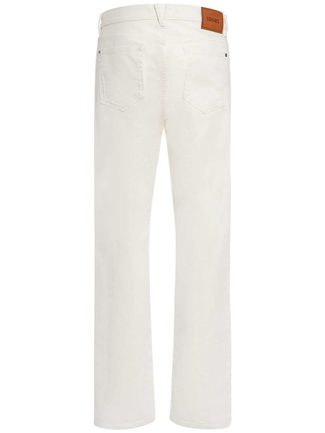 Shop Versace Cotton Denim Jeans In White