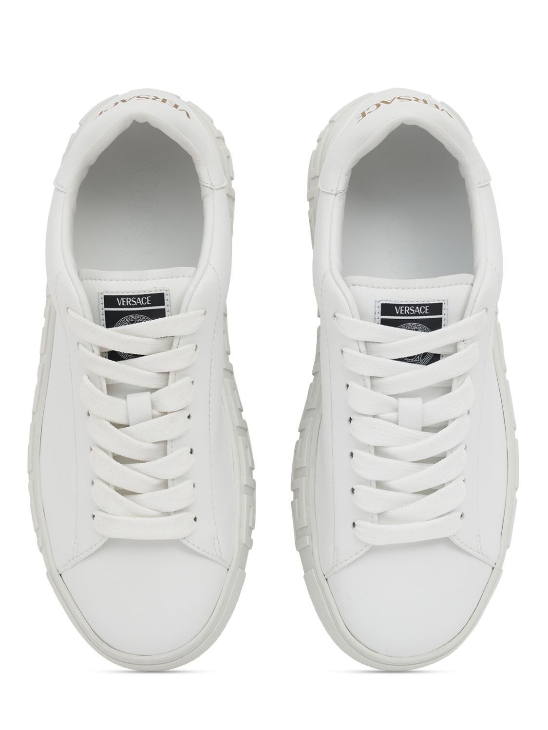 Shop Versace Responsible Leather Sneakers In 1w010-white