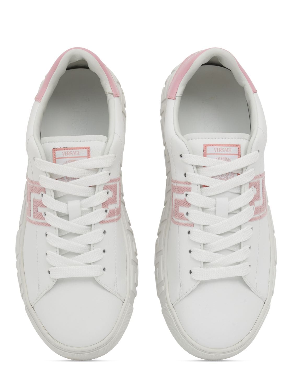 Shop Versace Embroidered Faux Leather Sneakers In White,pink